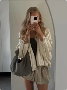 Elegant cream satin bomber jacket for women, stylish autumn fashion outfit mirror selfie