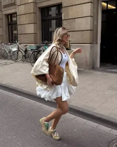 Elegant ivory satin bomber jacket for women featuring a high-quality silk-like finish