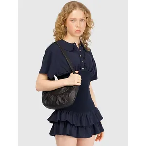 Elegante mini abito polo blu navy con colletto Peter Pan e orlo a volant chic