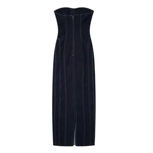 Close-up of slim fit denim midi dress with decorative topstitching and back slit