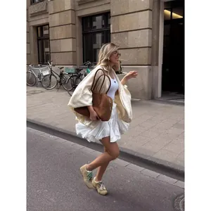 Elegant oversized satin bomber jacket for women in cream beige, autumn fashion street style