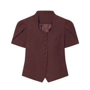 Front view of professional women's short sleeve blazer with lace trim and buttons