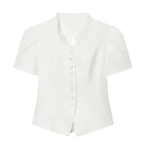 Front view of a white short-sleeved blazer with lace neckline and buttons