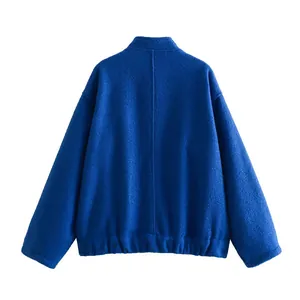 Back view of royal blue textured jacket with standing collar and elastic hem.