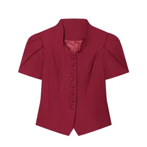 Front view of a burgundy short-sleeved blazer with stand collar and covered buttons