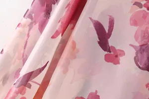 Macro detail of lightweight floral print fabric for elegant pink summer dress set