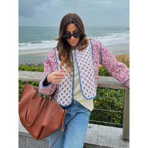 Stylish reversible floral print quilted jacket for women with cozy open front design
