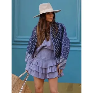 Bohemian style women's quilted jacket with floral print and purple tiered ruffle skirt