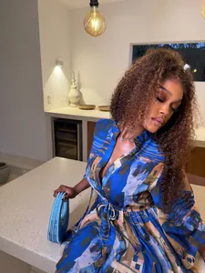 African print vacation shirt dress with drawstring waist in a modern kitchen setting