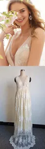 Sexy V-neck sleeveless lace wedding dress with floral embroidery and pearl details