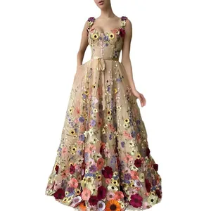 Elegant floor-length tulle dress with vibrant 3D floral embroidery and a ribbon waist belt.