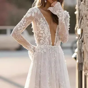 Elegant white lace long-sleeved wedding dress with deep V-neck and floral details