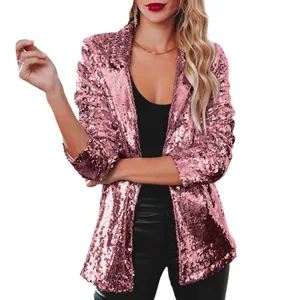 Close-up detail of women's sparkling pink sequined long sleeve blazer for party wear