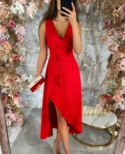 Elegant red V-neck sleeveless dress with asymmetrical ruffled hem for fashion parties