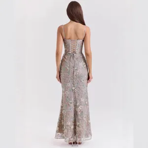 Detailed view of the elegant floral sequined long dress with lace-up back detail