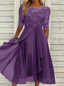 Detail view of purple chiffon lace patchwork evening gown showing embroidery texture