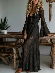 Elegant bohemian black lace long-sleeve V-neck maxi dress with flared bell sleeves