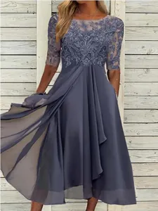 Elegant grey blue chiffon bridesmaid dress with lace hollow bodice and flowy midi skirt
