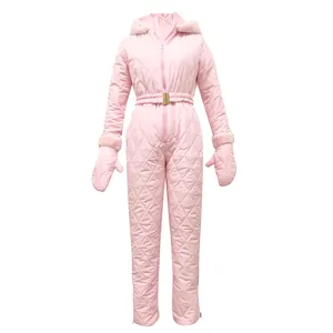 Detailed view of pink quilted one-piece ski suit featuring hood and matching mittens