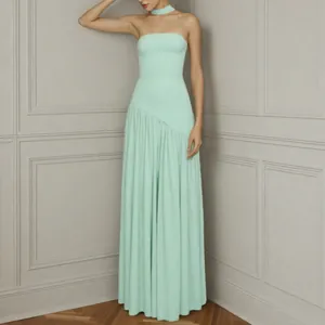 Elegant mint green strapless maxi evening dress with asymmetrical pleated skirt