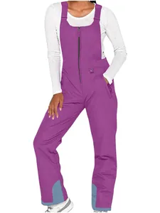 Detailed view of the purple outdoor ski bib pants with windproof waterproof fabric