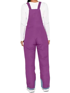 Rear view of high-quality purple insulated ski bib pants featuring waterproof fabric.