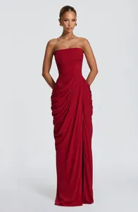 Elegant red strapless pleated slit evening gown for women, slim fit long dress variant.