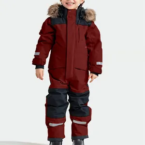 Combinaison de ski imperméable une pièce pour enfants bordeaux avec capuche en fausse fourrure