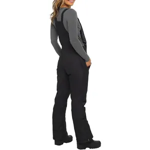 Back view of black waterproof ski bib pants with adjustable straps for outdoor winter sports.