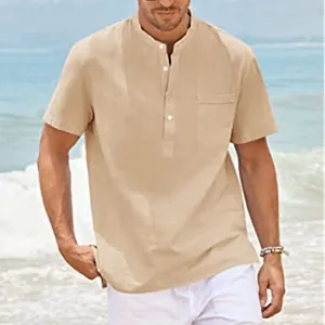 Detail view of men's khaki stand collar short sleeve shirt with linen texture on beach