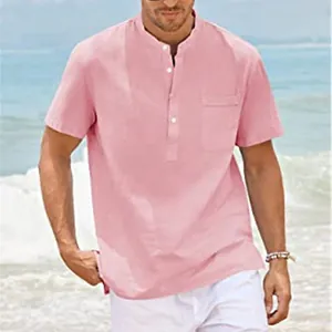 Close-up of men's pink stand-collar short sleeve casual linen-style shirt on a beach