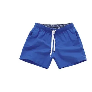 Bañador liso azul para hombre con cordón blanco y forro con diseño de flores azules