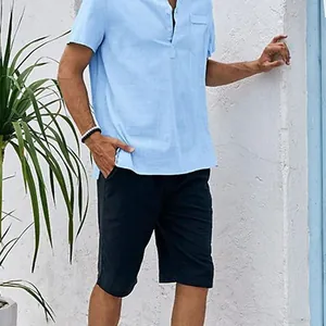 Men's summer casual outfit with a light blue stand collar short sleeve shirt and shorts