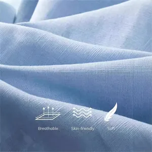 Detailed texture of breathable skin-friendly light blue cotton linen for men's beach shirt.