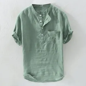 Detailed view of a men's light green short-sleeve linen cotton Henley shirt with pocket