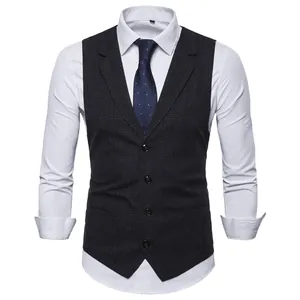 Detailed view of men's slim fit plaid suit vest with notched lapel and single-breasted buttons