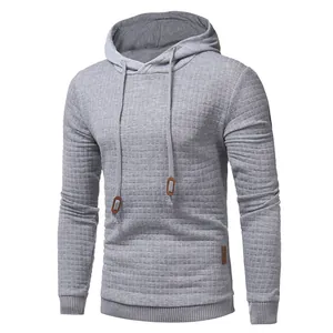Grey men's quilted hooded sweatshirt featuring a textured diamond pattern and drawstrings