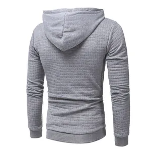 Back view of grey men's hooded sweatshirt with quilted diamond pattern texture