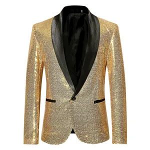 Detail shot of a gold sequined men's blazer featuring a black satin shawl lapel.