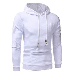 Detailed close-up of a white men's quilted hoodie with a textured rhombus pattern