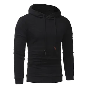 Detailed macro view showing the premium black quilted texture on this men's hooded sweatshirt