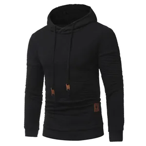 Men's black hooded pullover featuring a textured lattice pattern and drawstring hood.