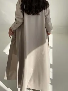 Detailed back view of an elegant light grey open cardigan robe with sunflower embroidery