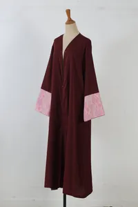 Elegant burgundy long cardigan abaya robe featuring stylish printed batwing sleeves detail