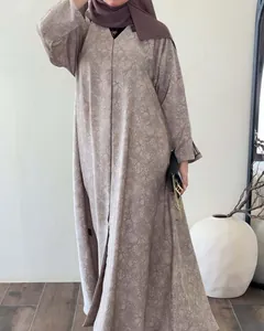 Elegant patterned long-sleeved dress for a sophisticated commute look
