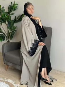 Elegant beige and black open robe featuring intricate floral lace embroidery on sleeves