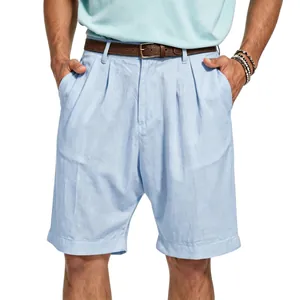 Detailed texture of light blue pleated linen shorts for men in old money summer style