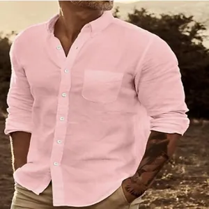 Detail of a stylish men's casual pink long-sleeve button-down shirt with a chest pocket.