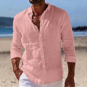 Close-up of casual pink long-sleeved linen shirt for men with white buttons and lapel collar