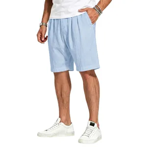 Detail of breathable men's light blue linen shorts featuring a relaxed resort style design
